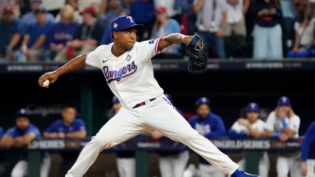 Oct 27, 2023; Arlington, TX, USA; Texas Rangers pitcher Jose Leclerc (25) throws during the tenth inning in game one of the 2023 World Series against the Arizona Diamondbacks at Globe Life Field. Mandatory Credit: Raymond Carlin III-USA TODAY Sports